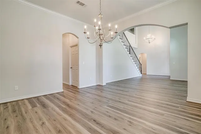 a view of a livingroom with wooden floor