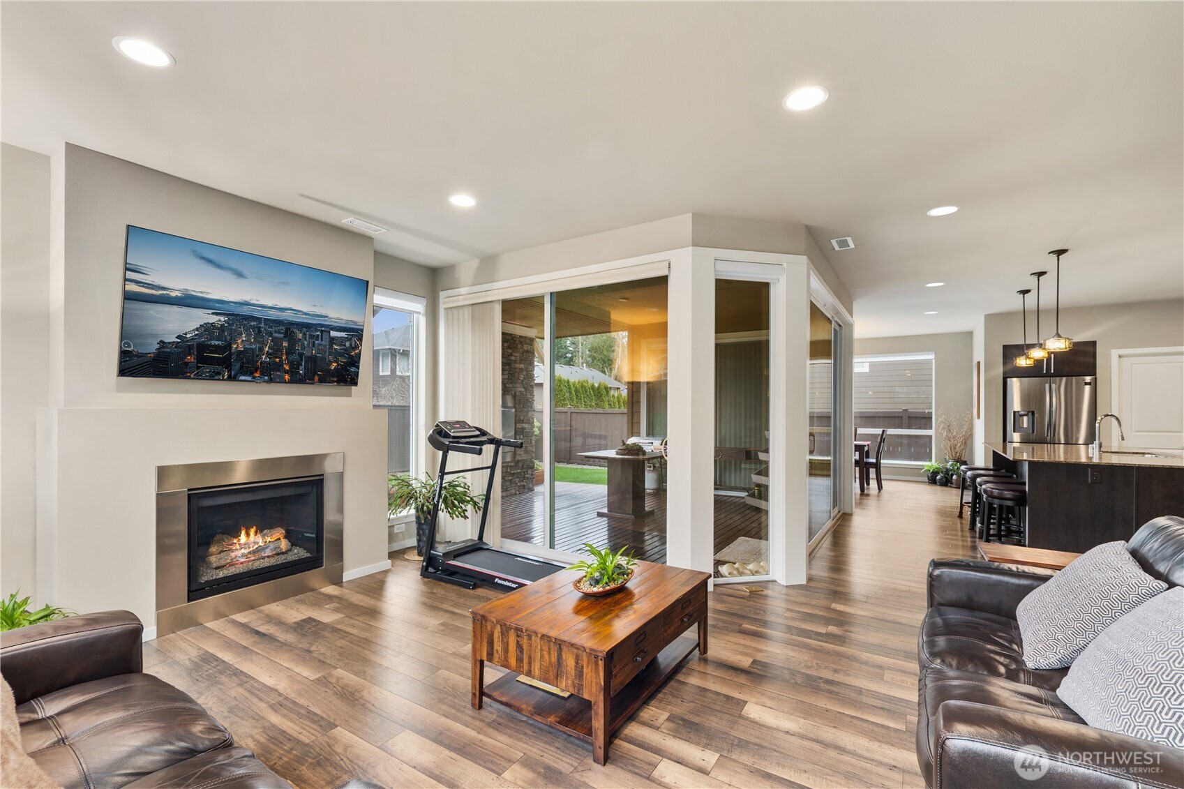 5627 South 336th Place Auburn, WA 98001 - Photo 12 of 40 a living room with furniture and a fireplace