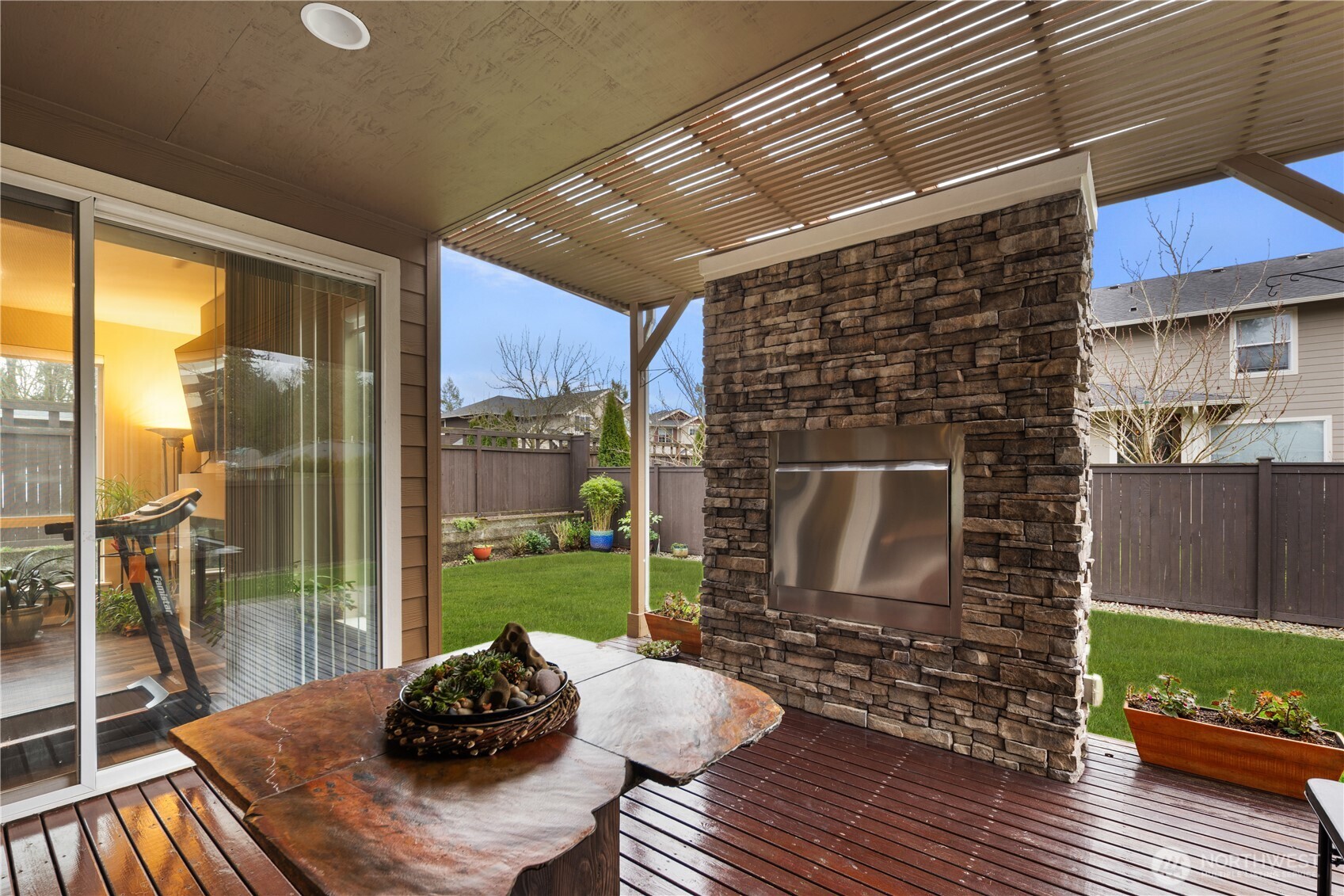 5627 South 336th Place Auburn, WA 98001 - Photo 14 of 40 a room with furniture and a fireplace