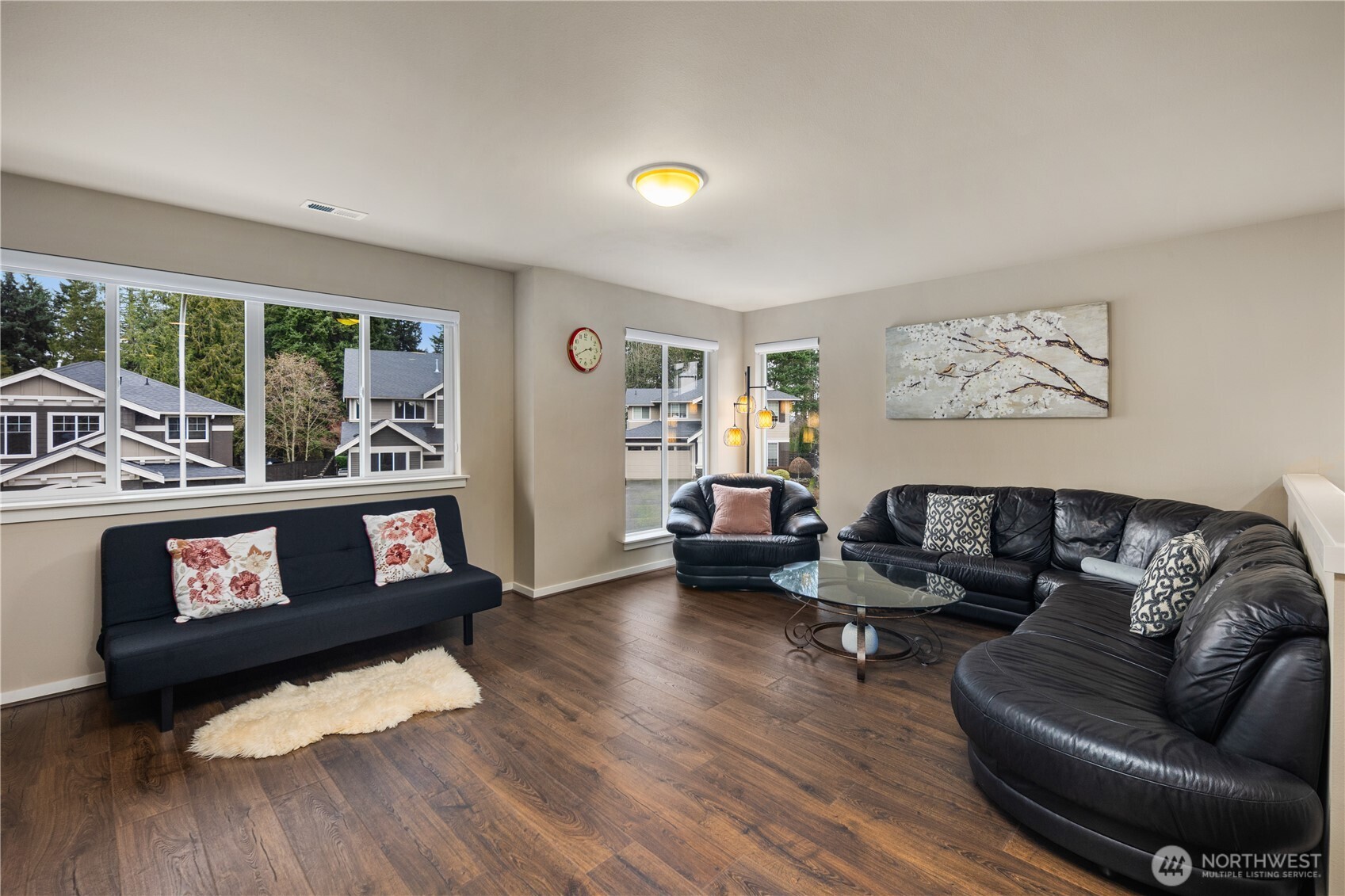 5627 South 336th Place Auburn, WA 98001 - Photo 17 of 40 a living room with furniture and a fireplace