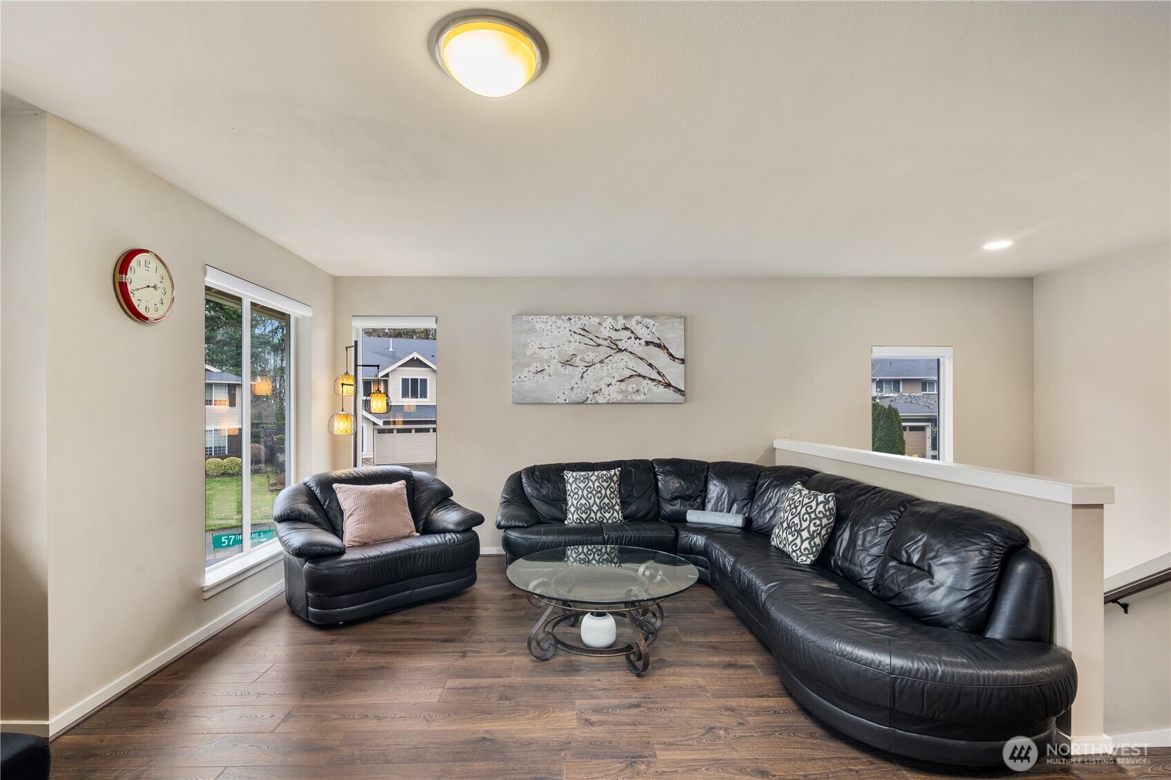 5627 South 336th Place Auburn, WA 98001 - Photo 18 of 40 a living room with furniture and a wooden floor