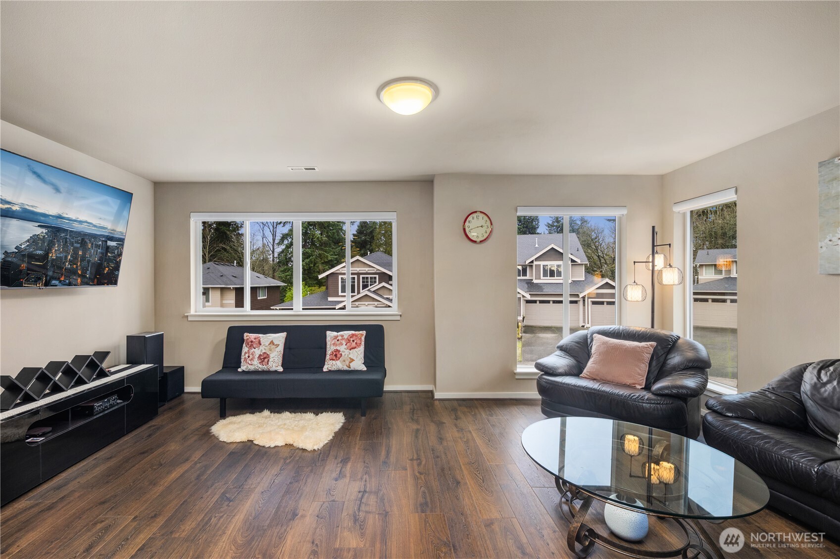 5627 South 336th Place Auburn, WA 98001 - Photo 19 of 40 a living room with furniture and a wooden floor