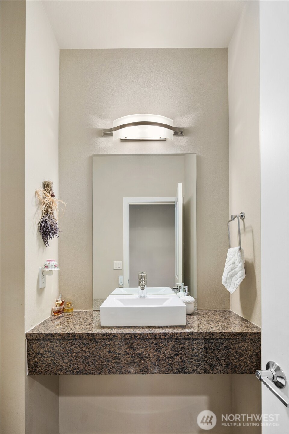 5627 South 336th Place Auburn, WA 98001 - Photo 23 of 40 a bathroom with a granite countertop sink and a mirror