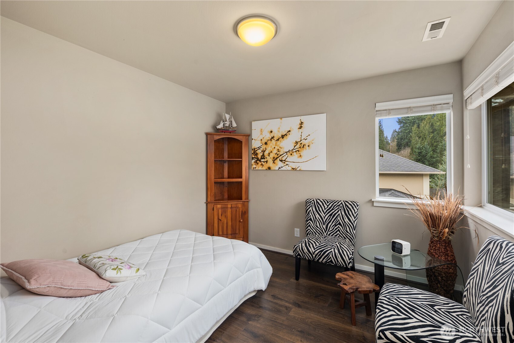 5627 South 336th Place Auburn, WA 98001 - Photo 27 of 40 a bedroom with a bed and a window