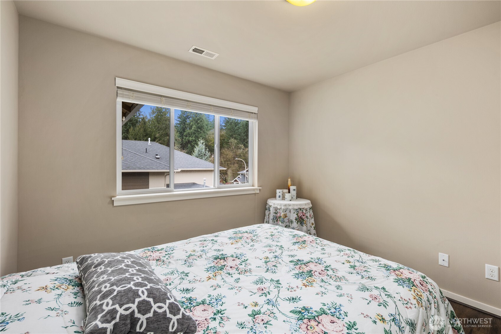 5627 South 336th Place Auburn, WA 98001 - Photo 31 of 40 a bedroom with a bed and a window