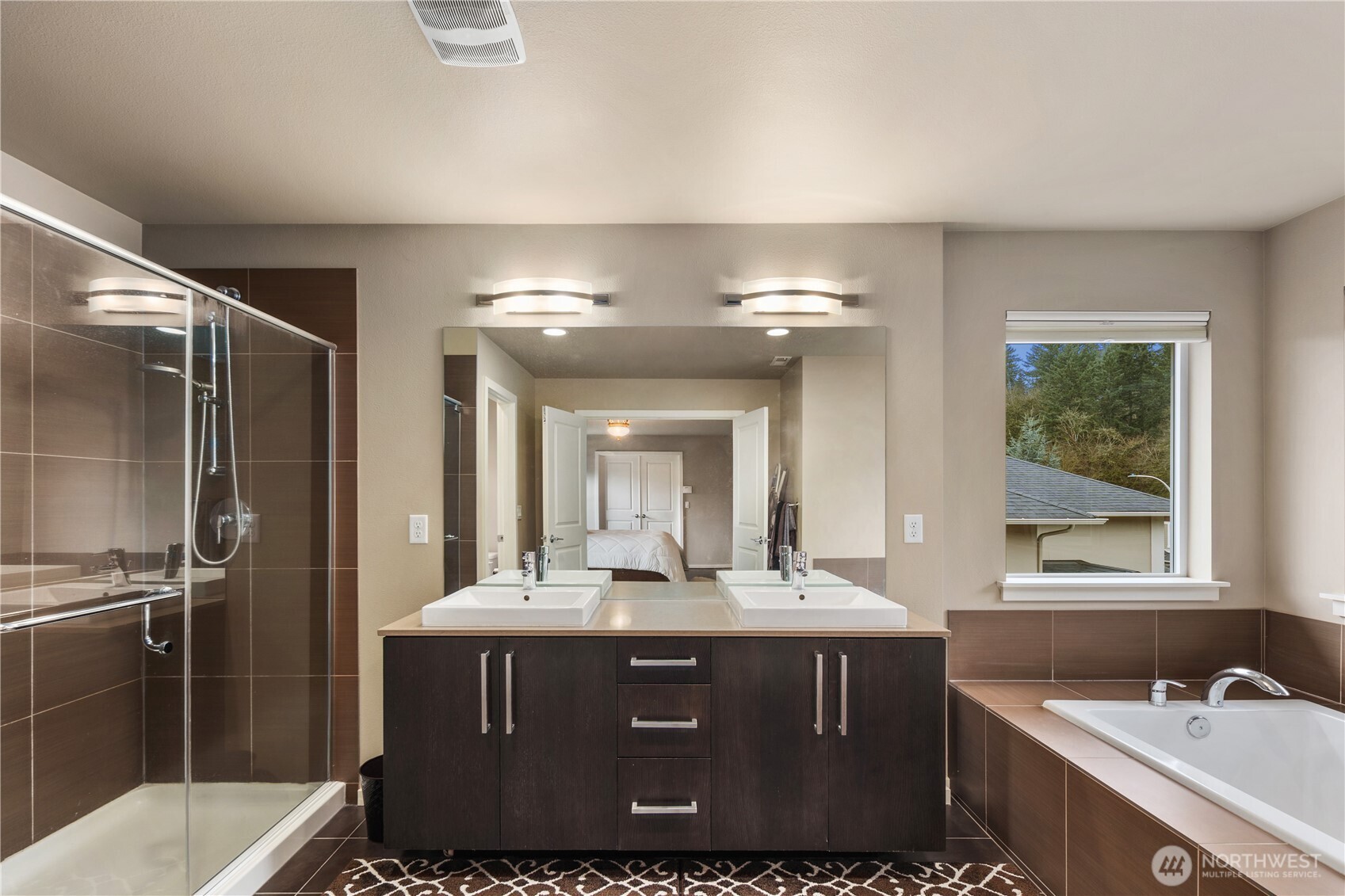 5627 South 336th Place Auburn, WA 98001 - Photo 35 of 40 a bathroom with a sink double vanity and a mirror