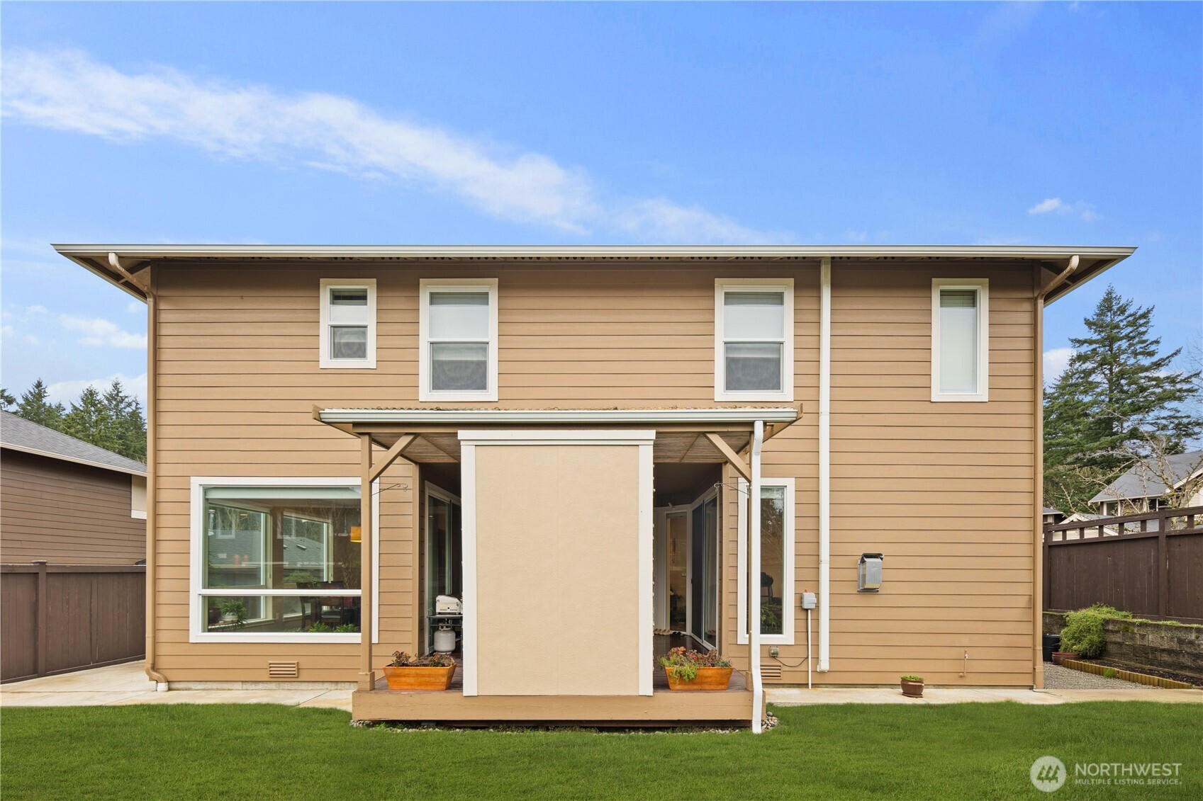 5627 South 336th Place Auburn, WA 98001 - Photo 39 of 40 a front view of a house with a yard
