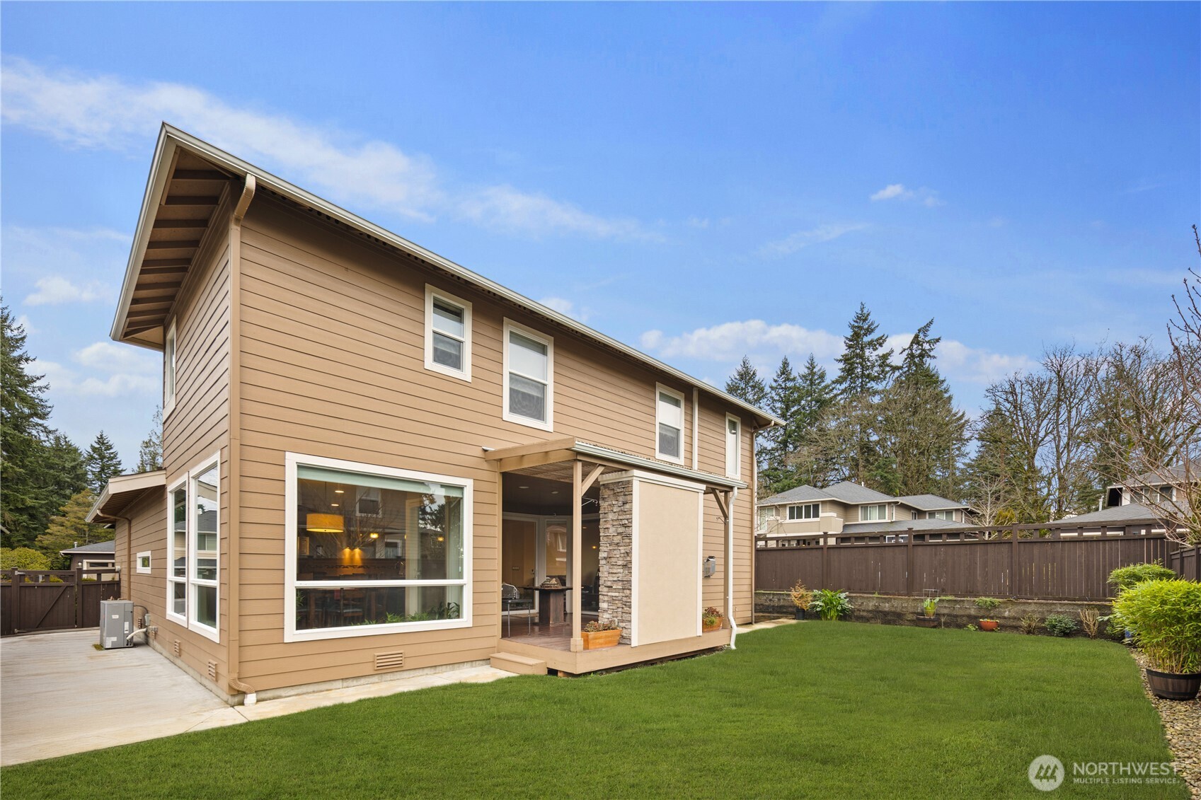 5627 South 336th Place Auburn, WA 98001 - Photo 40 of 40 a front view of a house with a yard