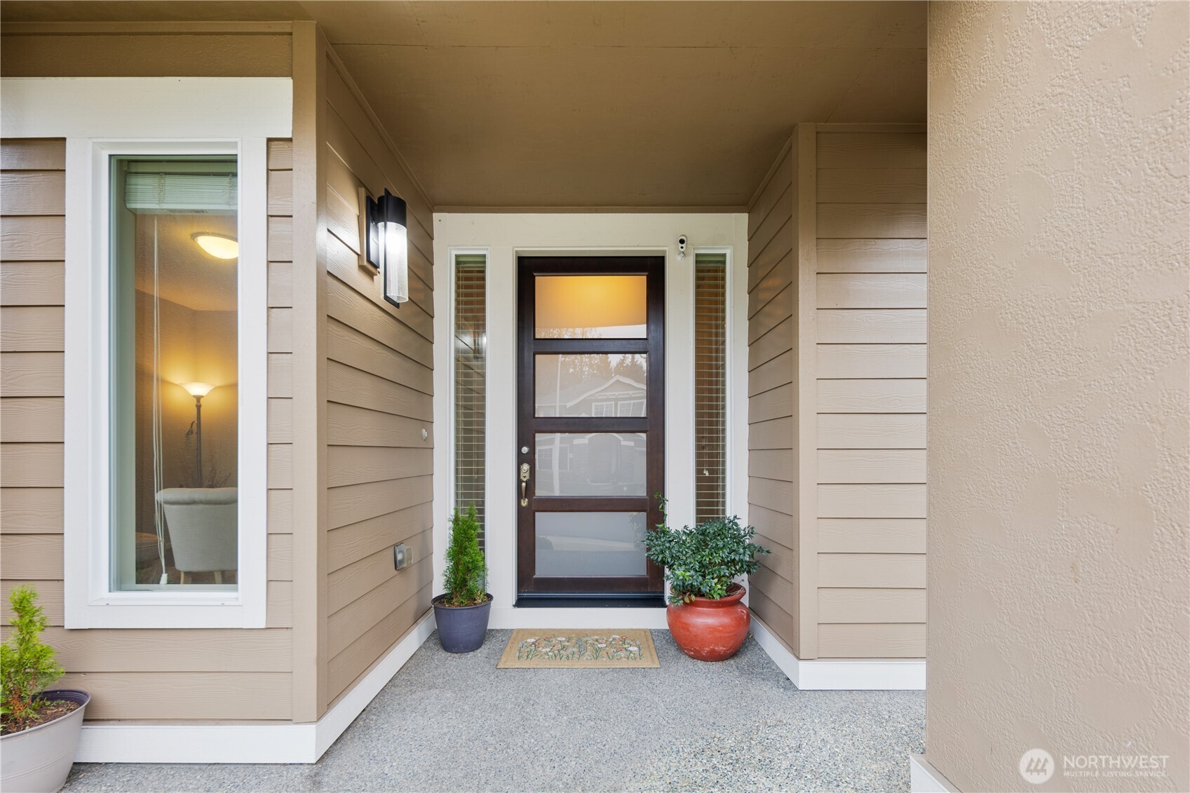5627 South 336th Place Auburn, WA 98001 - Photo 4 of 40 a view of an entryway of house and front door