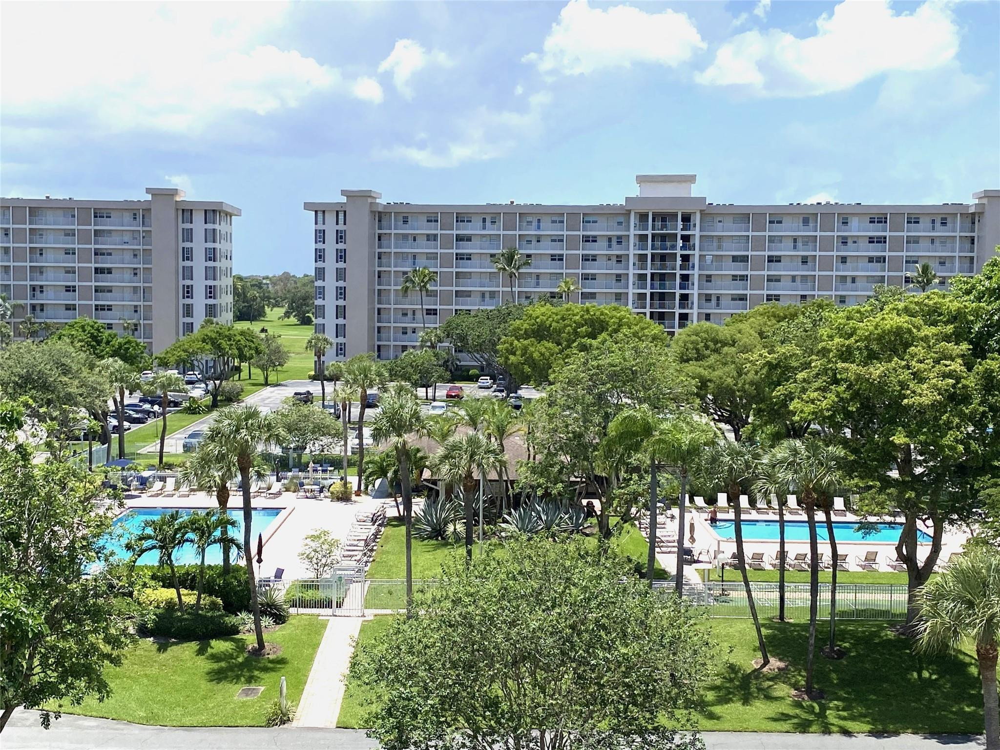 2601 South Course Drive, Unit 406 Pompano Beach, FL 33069 - Photo 13 of 15 a view of a city with tall buildings