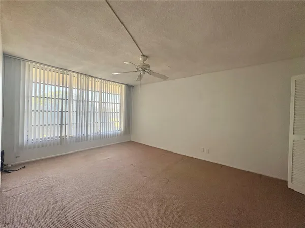 en empty room with windows