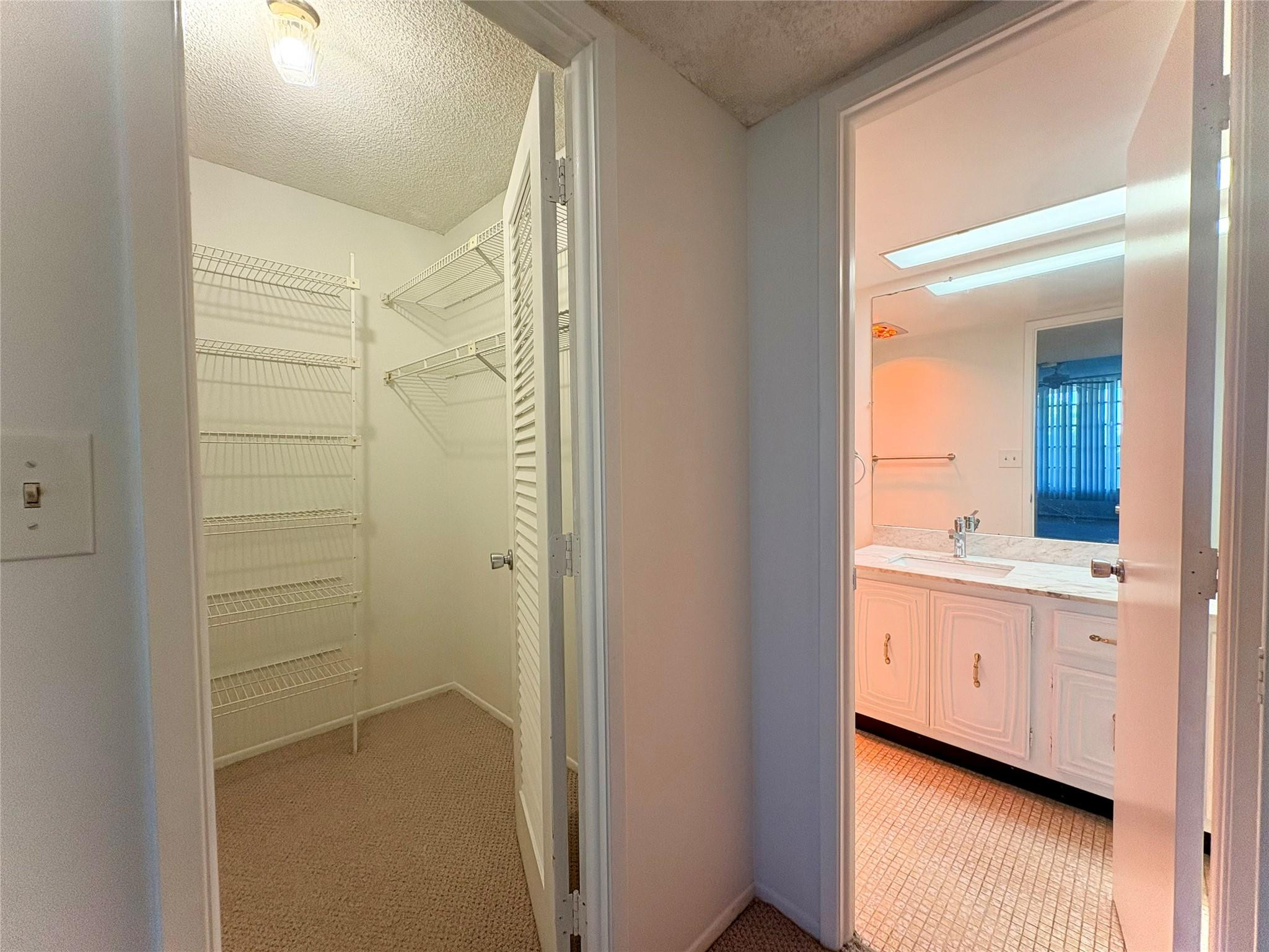 2601 South Course Drive, Unit 406 Pompano Beach, FL 33069 - Photo 8 of 15 a bathroom with a shower and a sink