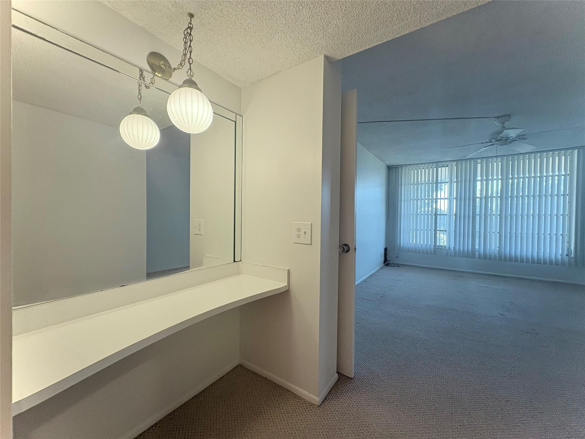 2601 South Course Drive, Unit 406 Pompano Beach, FL 33069 - Photo 9 of 15 a view of an empty room with a window