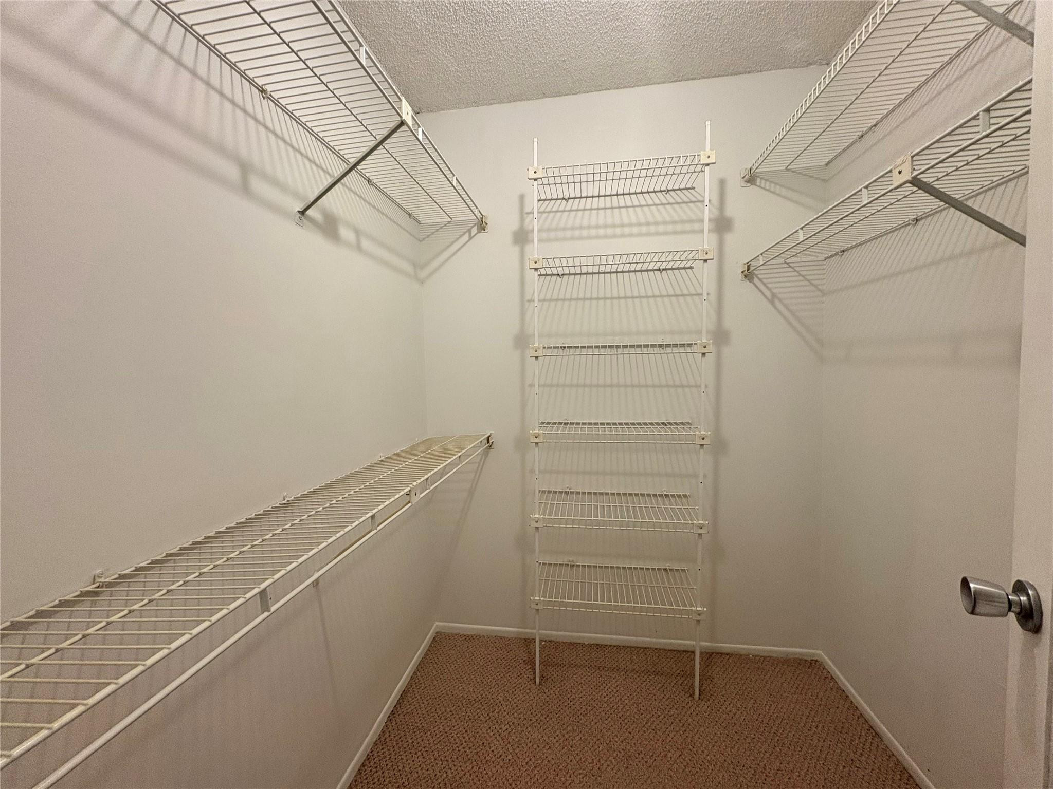 2601 South Course Drive, Unit 406 Pompano Beach, FL 33069 - Photo 10 of 15 a view of walk in closet