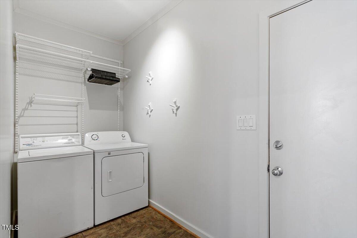 5920 Orchid Valley Road Raleigh, NC 27613 - Photo 27 of 54 Laundry room and garage ingress/egress