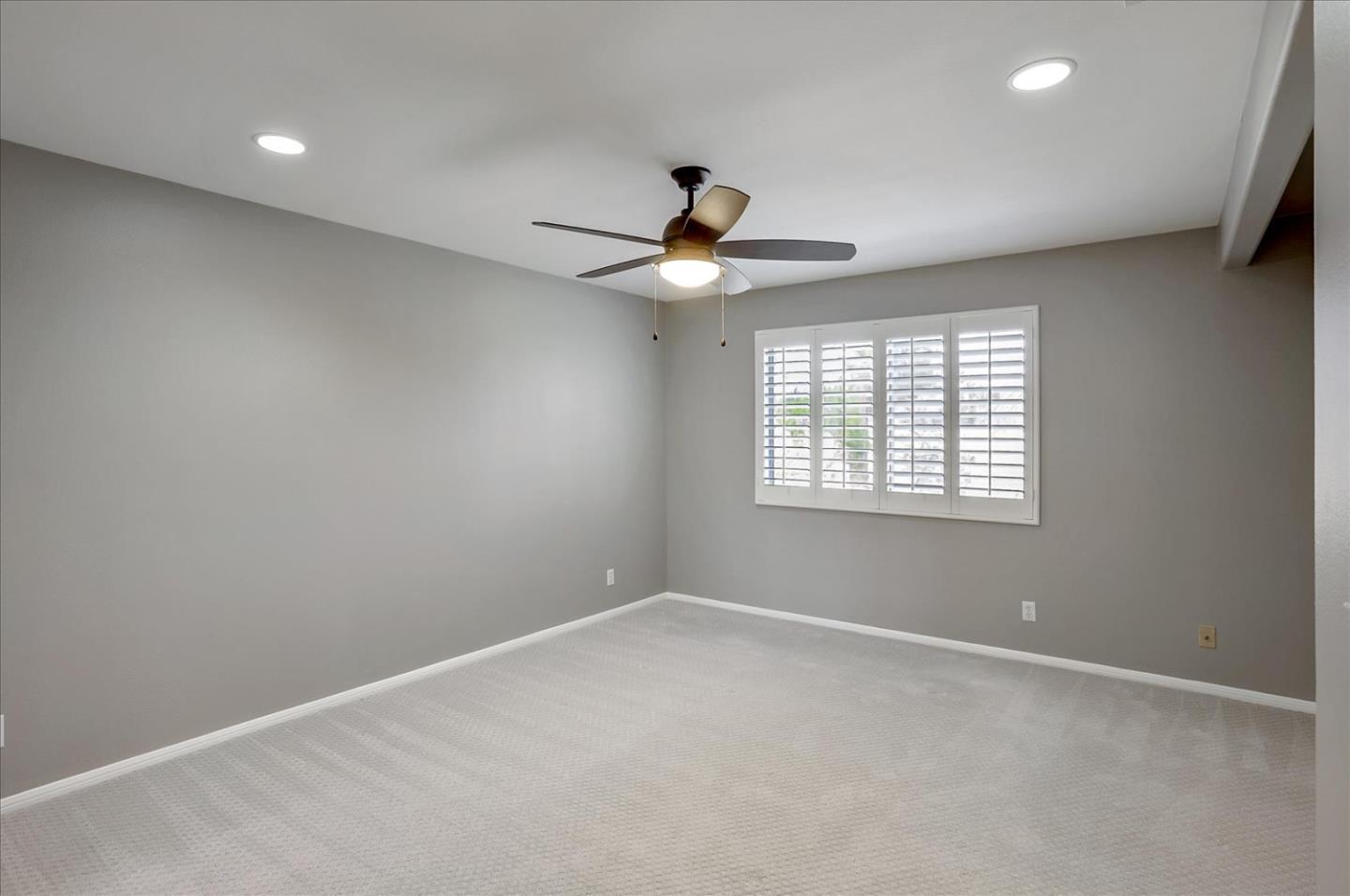 25307 Carson Way Stevenson Ranch, CA 91381 - Photo 24 of 36 an empty room with a window and a fan