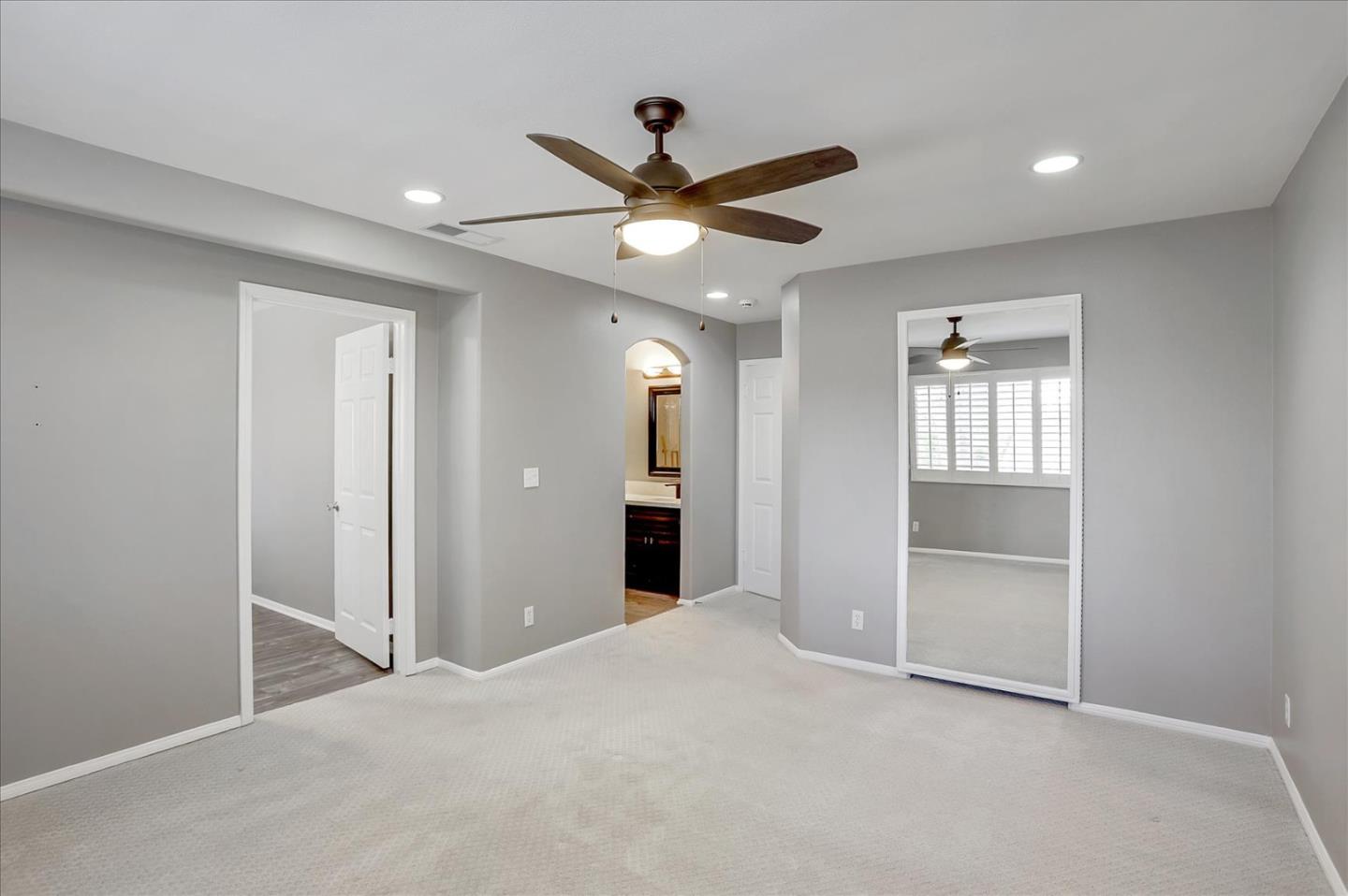 25307 Carson Way Stevenson Ranch, CA 91381 - Photo 25 of 36 a view of a livingroom with a ceiling fan and window