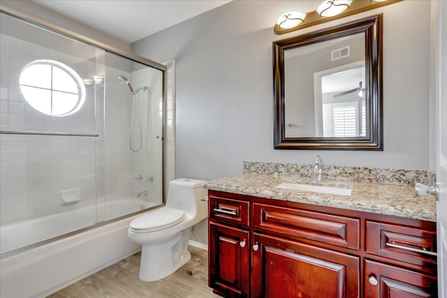25307 Carson Way Stevenson Ranch, CA 91381 - Photo 29 of 36 a bathroom with a toilet sink and mirror