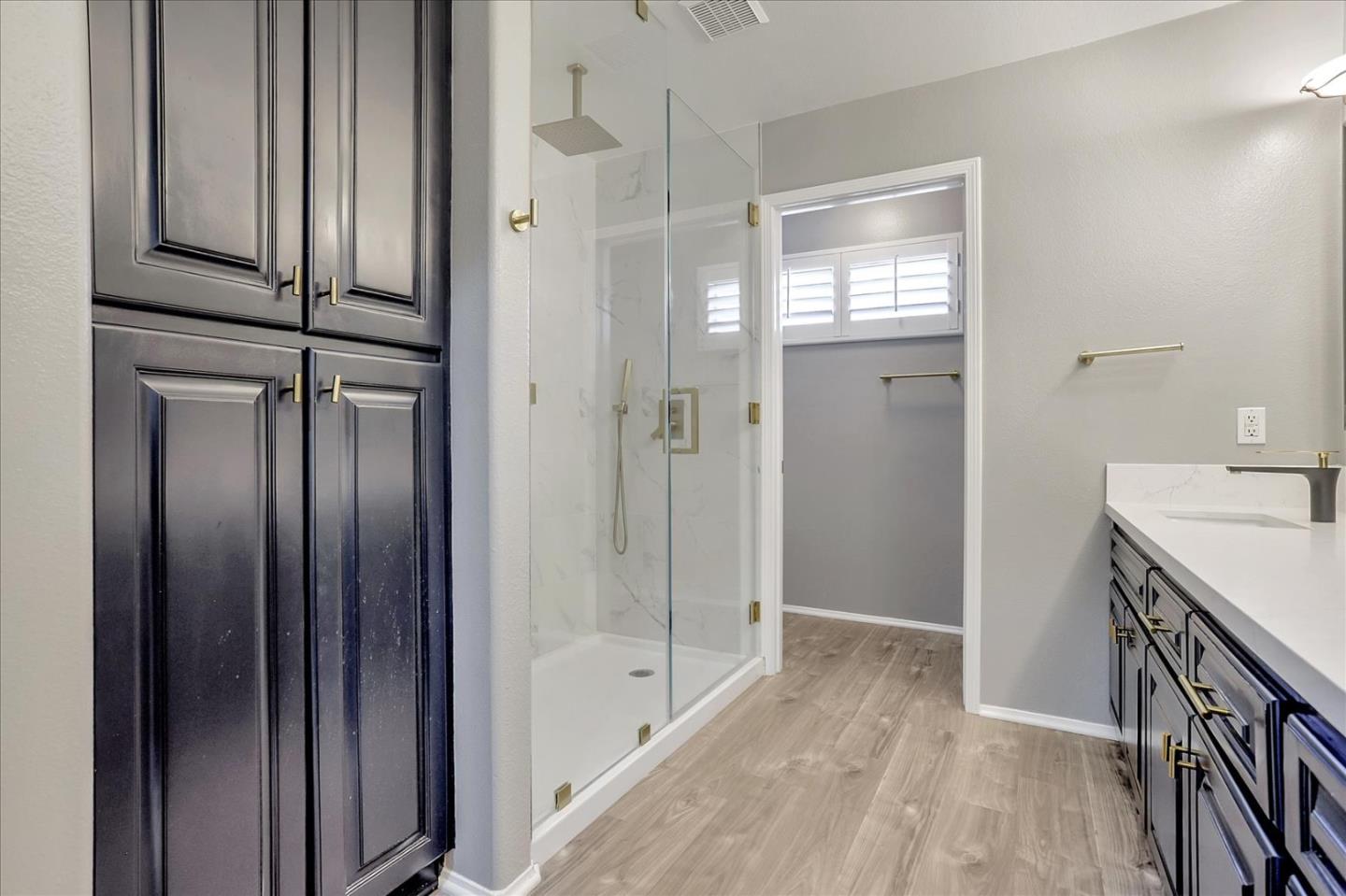 25307 Carson Way Stevenson Ranch, CA 91381 - Photo 31 of 36 a bathroom with a shower and a sink