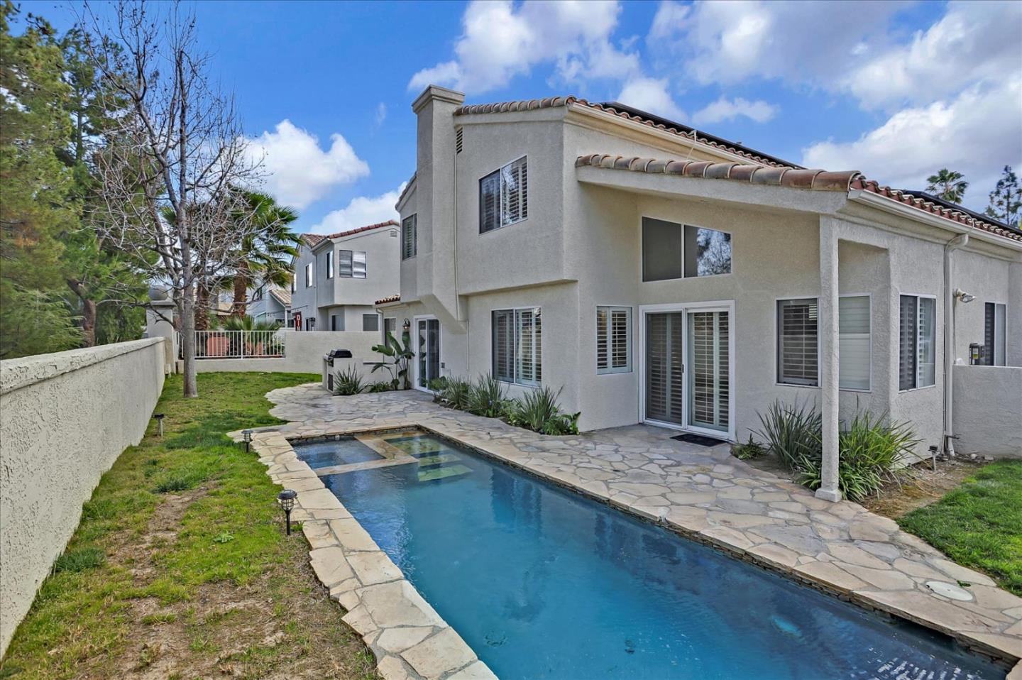 25307 Carson Way Stevenson Ranch, CA 91381 - Photo 35 of 36 a front view of a house with a yard