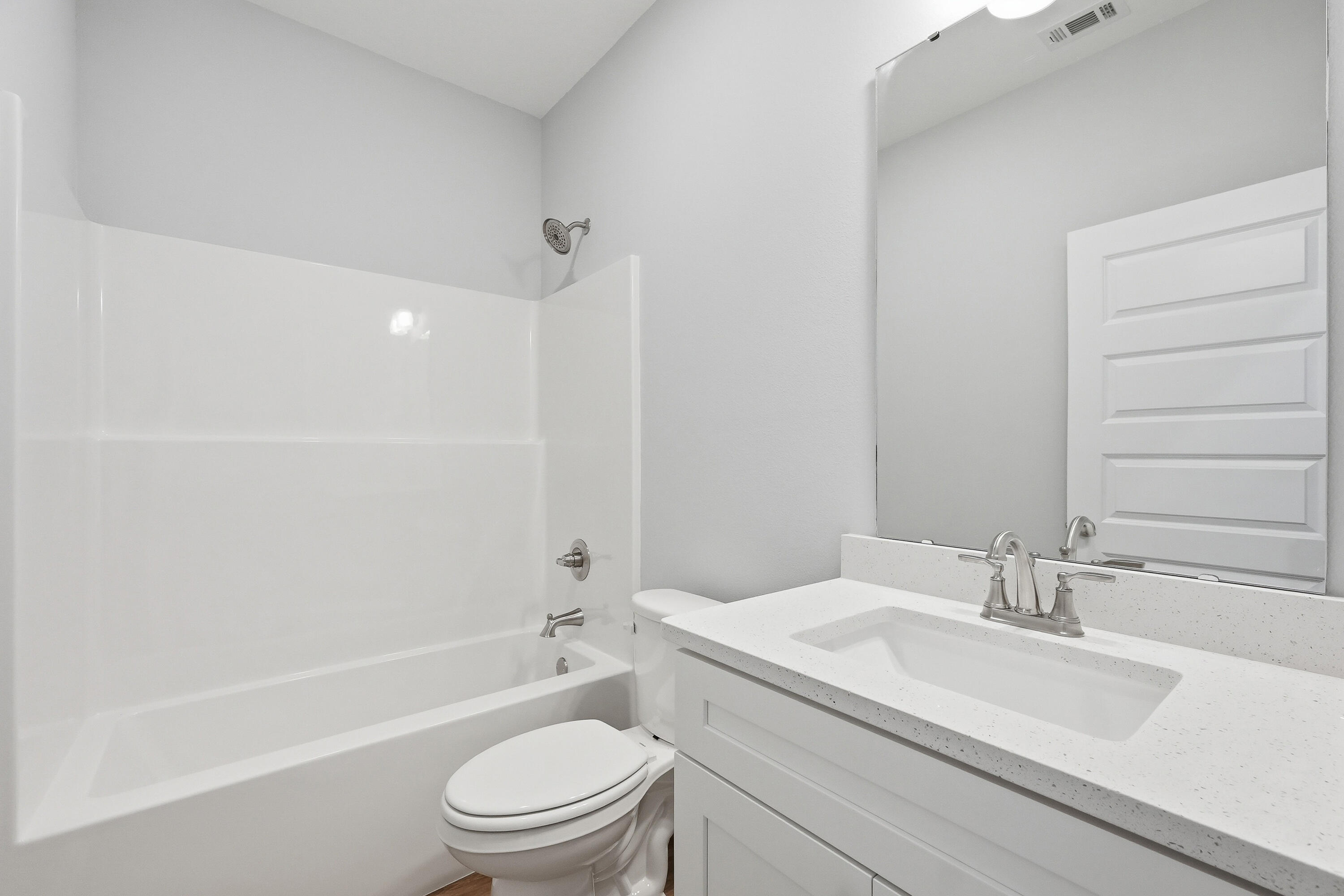 2588 Kingston Road Crestview, FL 32536 - Photo 17 of 23 a bathroom with a granite countertop sink a toilet and shower
