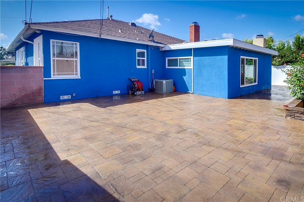 7863 Lyndora Street Downey, CA 90242 - Photo 19 of 27 a view of a house with a yard
