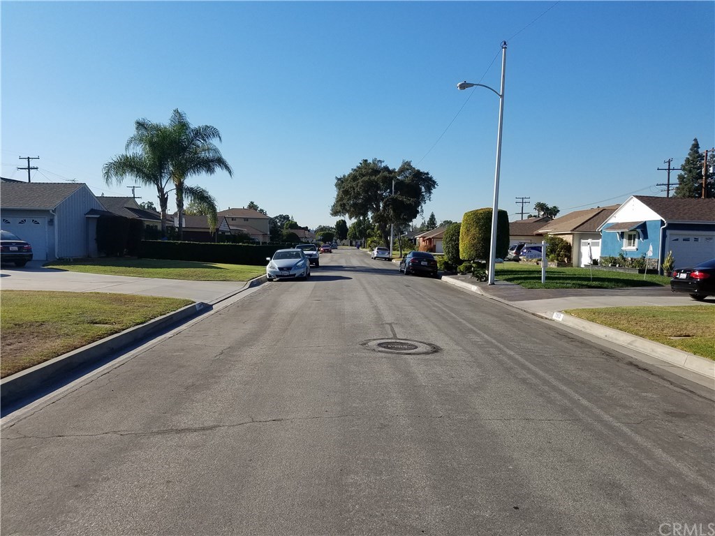7863 Lyndora Street Downey, CA 90242 - Photo 24 of 27 a view of a swimming pool with a chair