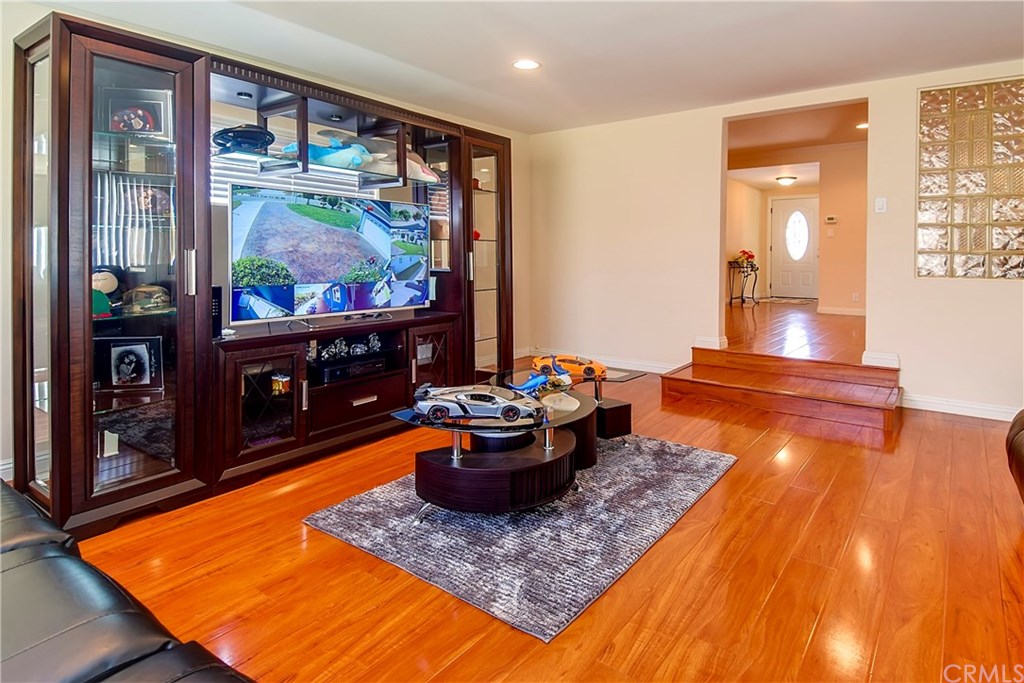 7863 Lyndora Street Downey, CA 90242 - Photo 7 of 27 a room with table and chairs