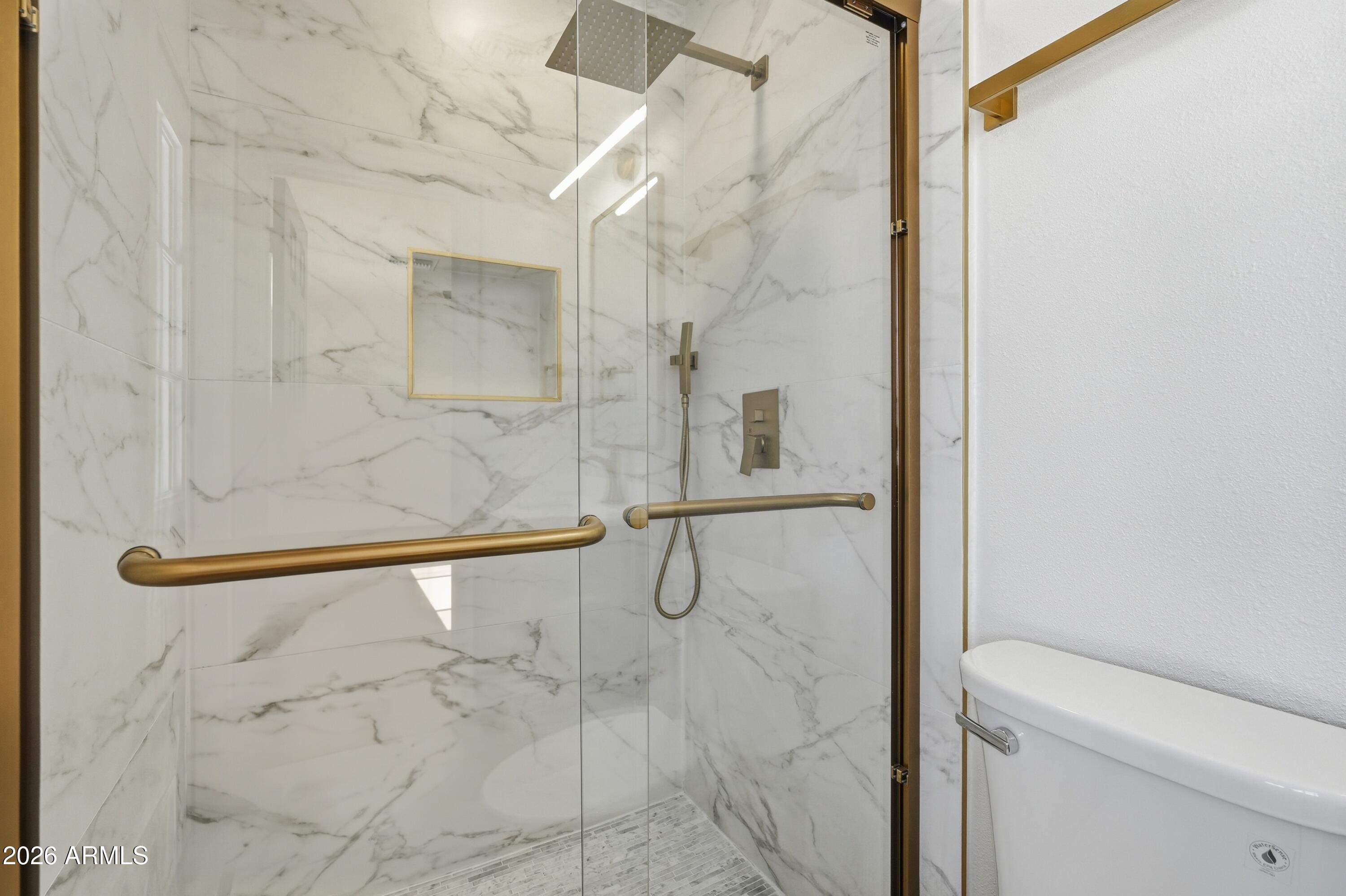 3327 West Wethersfield Road Phoenix, AZ 85029 - Photo 11 of 30 a bathroom with a shower