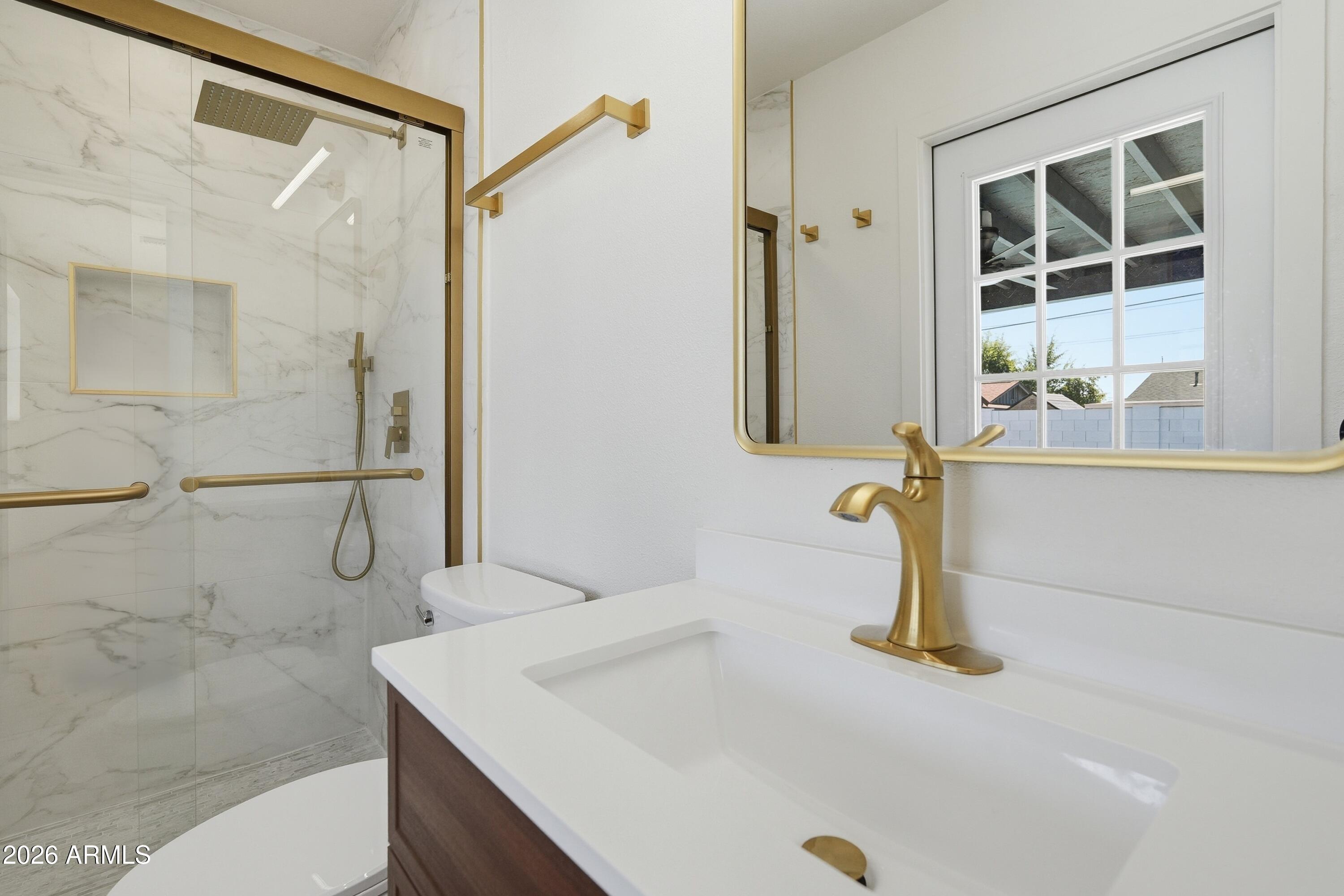3327 West Wethersfield Road Phoenix, AZ 85029 - Photo 12 of 30 a bathroom with a sink