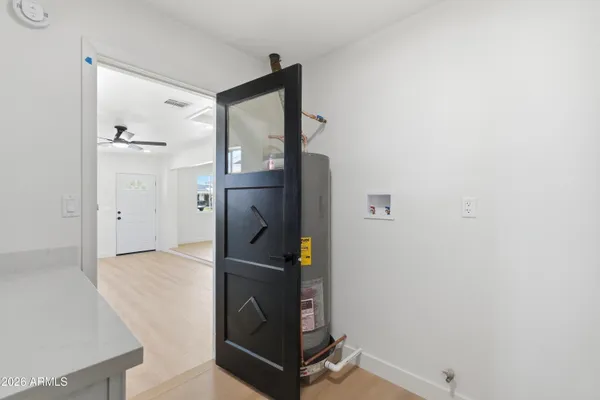 a view of hallway with walk in closet
