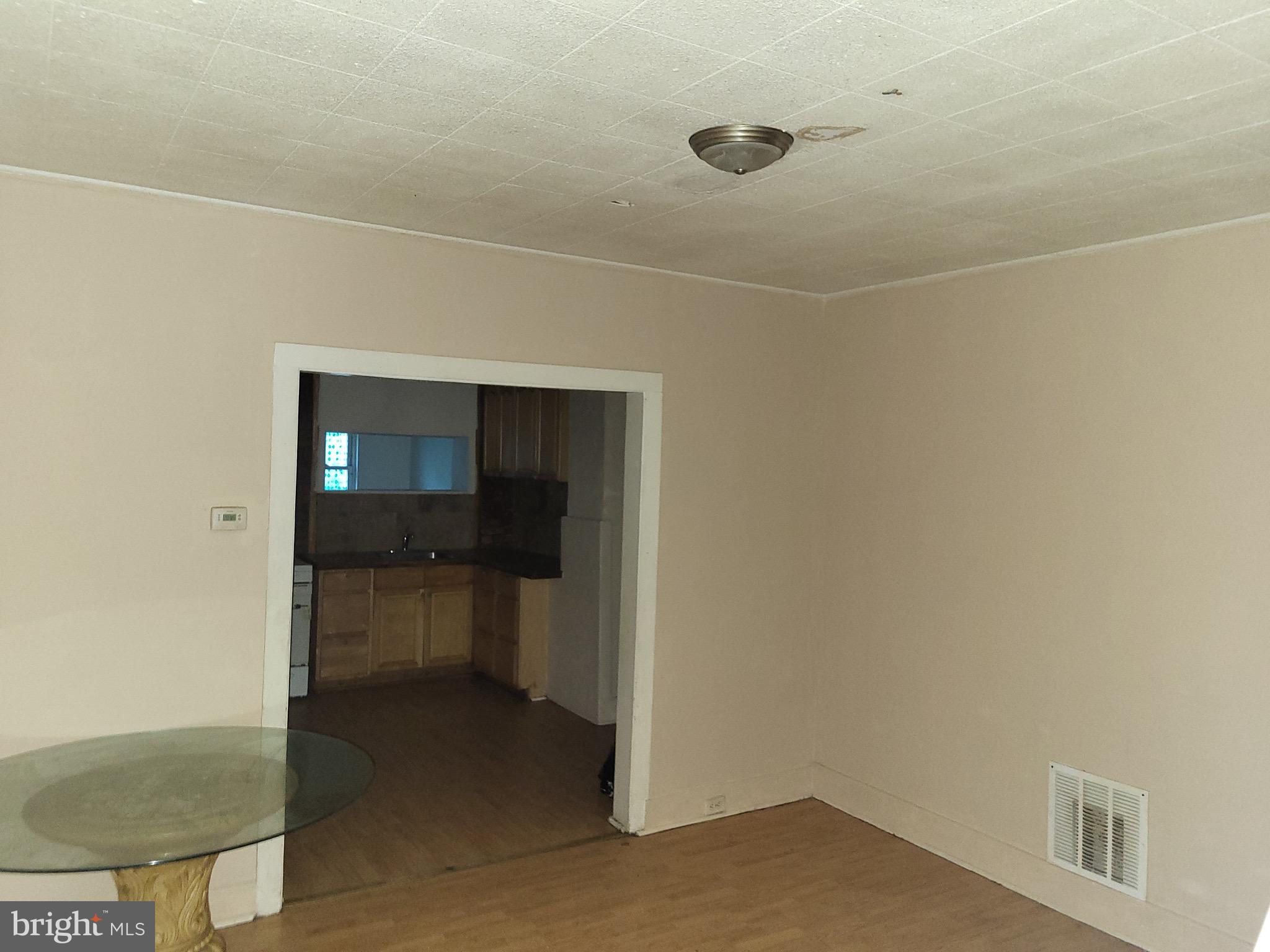 423 Furrow Street Baltimore, MD 21223 - Photo 4 of 13 a bathroom with a sink and a toilet