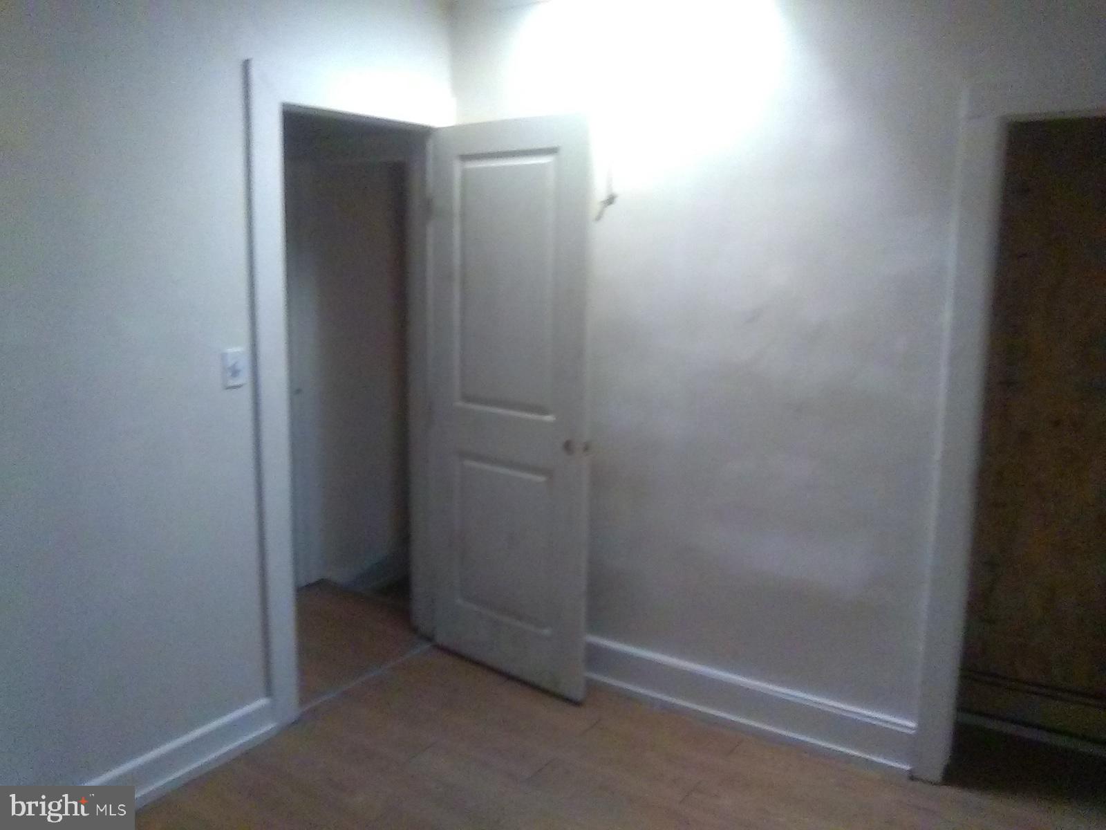 423 Furrow Street Baltimore, MD 21223 - Photo 9 of 13 an empty room with closet