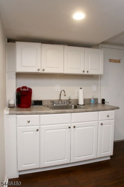 207 Patriots Road Morris Plains, NJ 07950 - Photo 20 of 25 a kitchen with granite countertop white cabinets and a sink