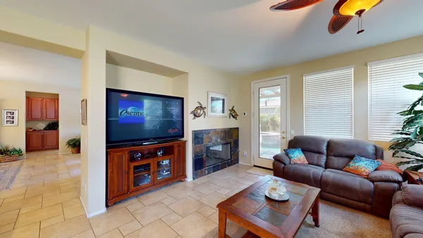 a living room with furniture and a window