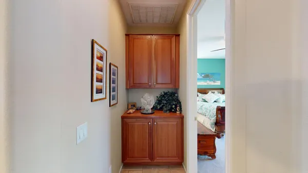 a bathroom with a double vanity sink a mirror and a bathtub