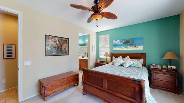 a room with furniture and large window