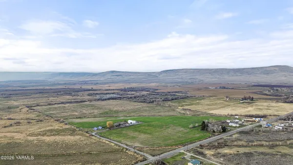 a view of a lake with a big yard