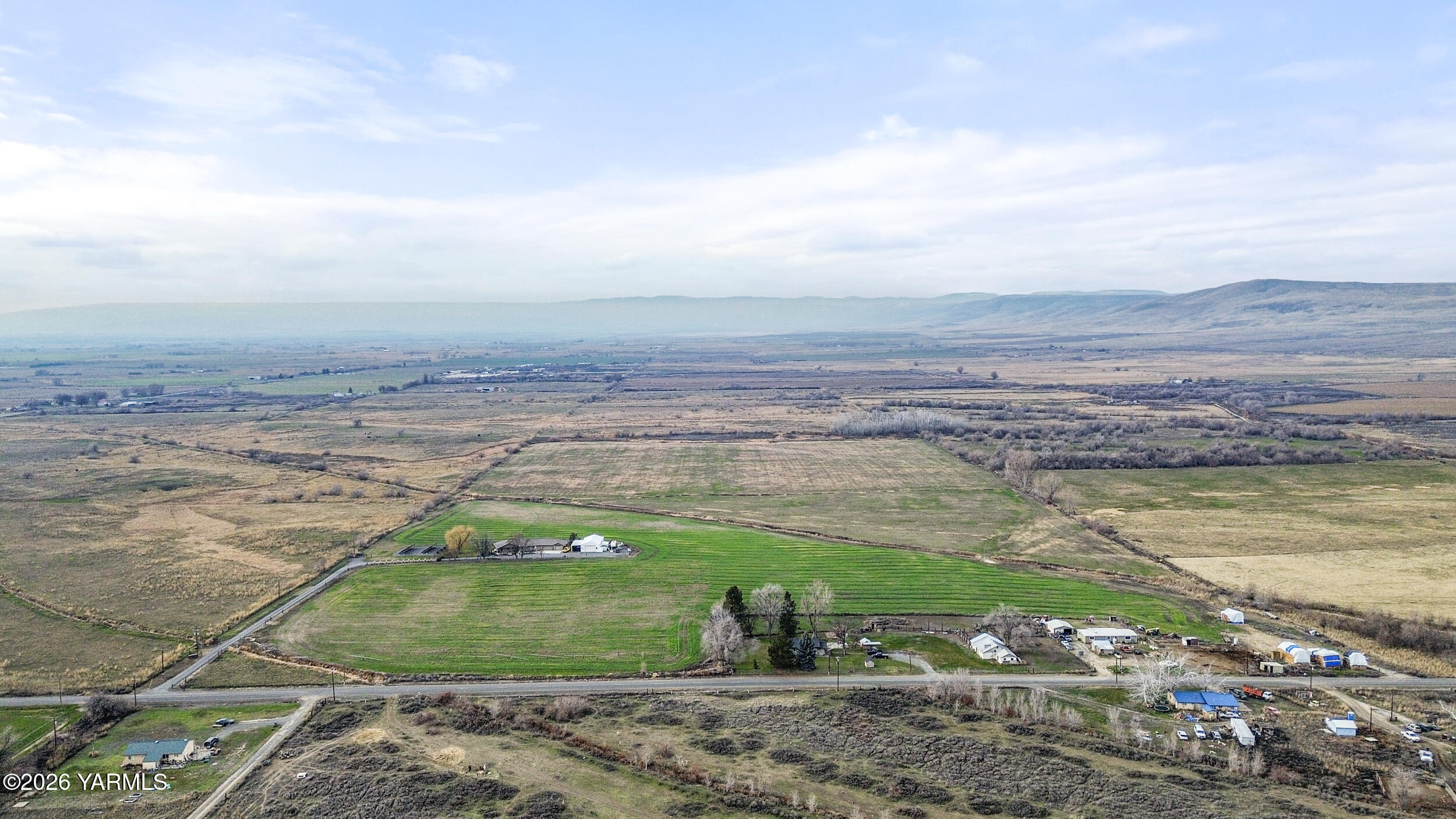 Nka Shields Road Wapato, WA 98951 - Photo 12 of 14 a view of a lake with a big yard