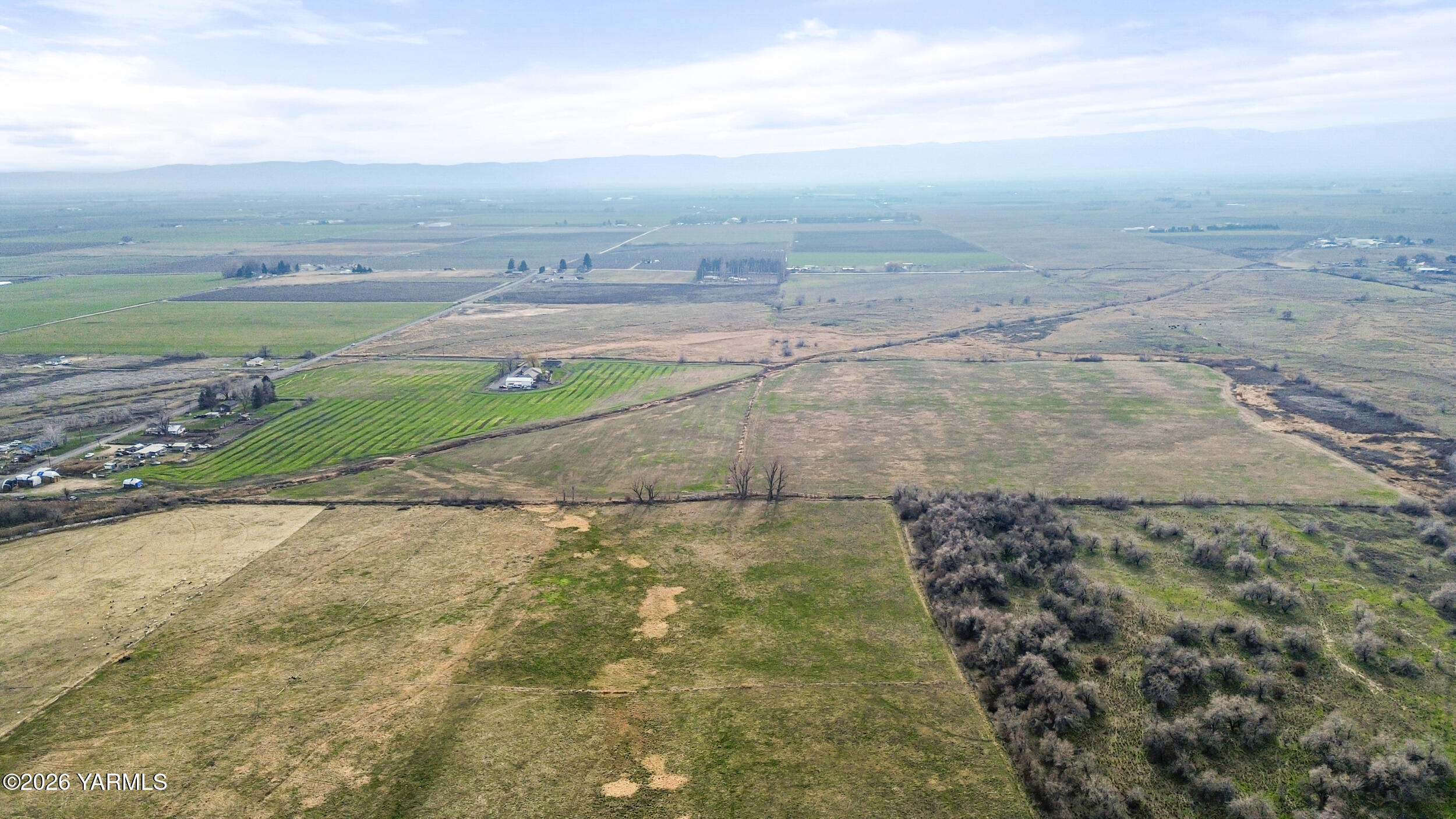 Nka Shields Road Wapato, WA 98951 - Photo 7 of 14 a view of a yard with an ocean view