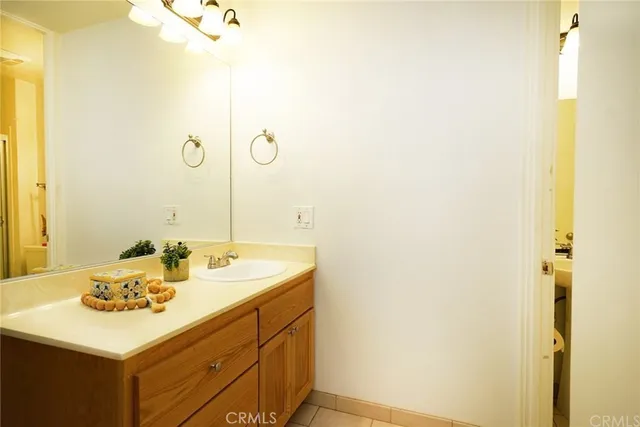 a bathroom with a sink and a shower