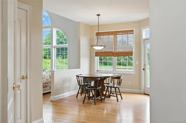 a bedroom with a bed and a table