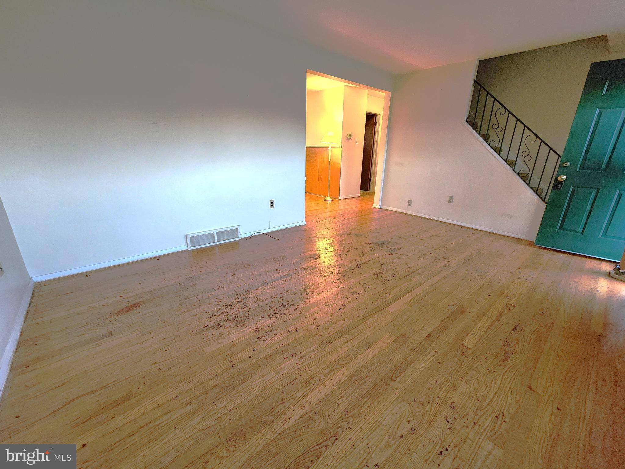 7 Saranac Road Hamilton, NJ 08619 - Photo 6 of 19 a view of an empty room with wooden floor and a window