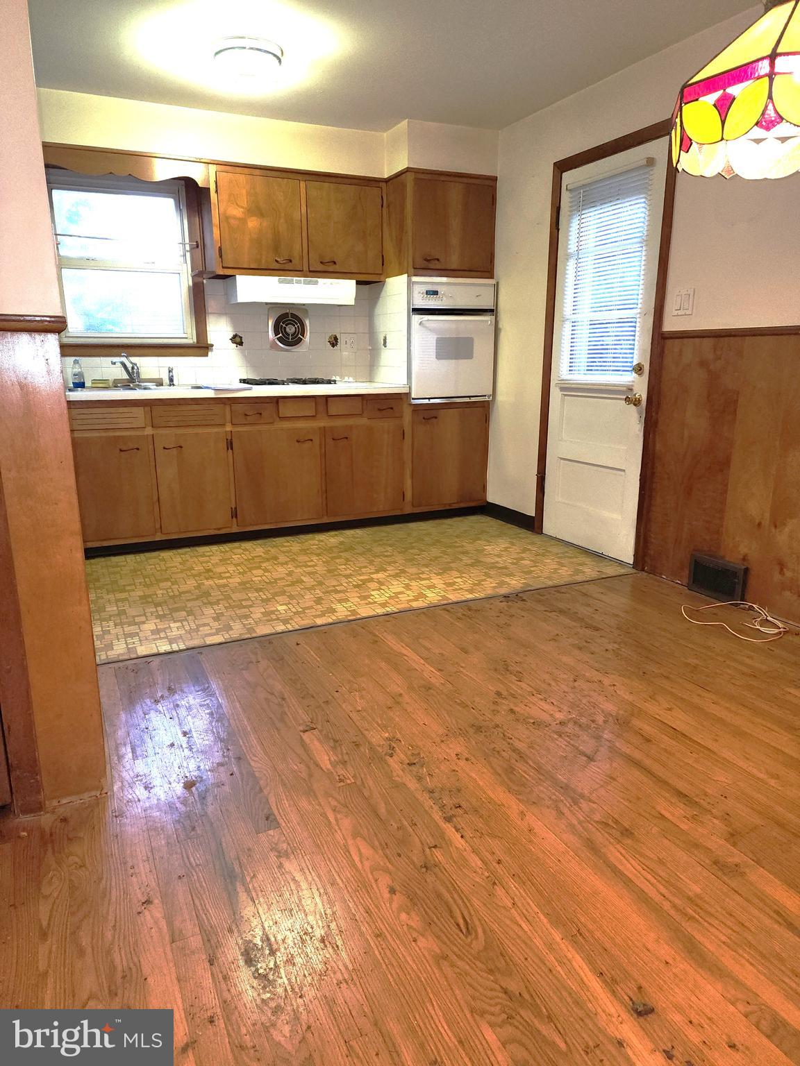 7 Saranac Road Hamilton, NJ 08619 - Photo 10 of 19 a view of a kitchen with wooden floor and electronic appliances