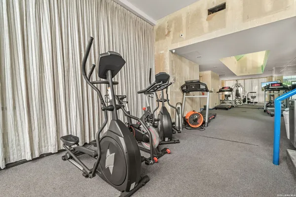 a view of a room with gym equipment