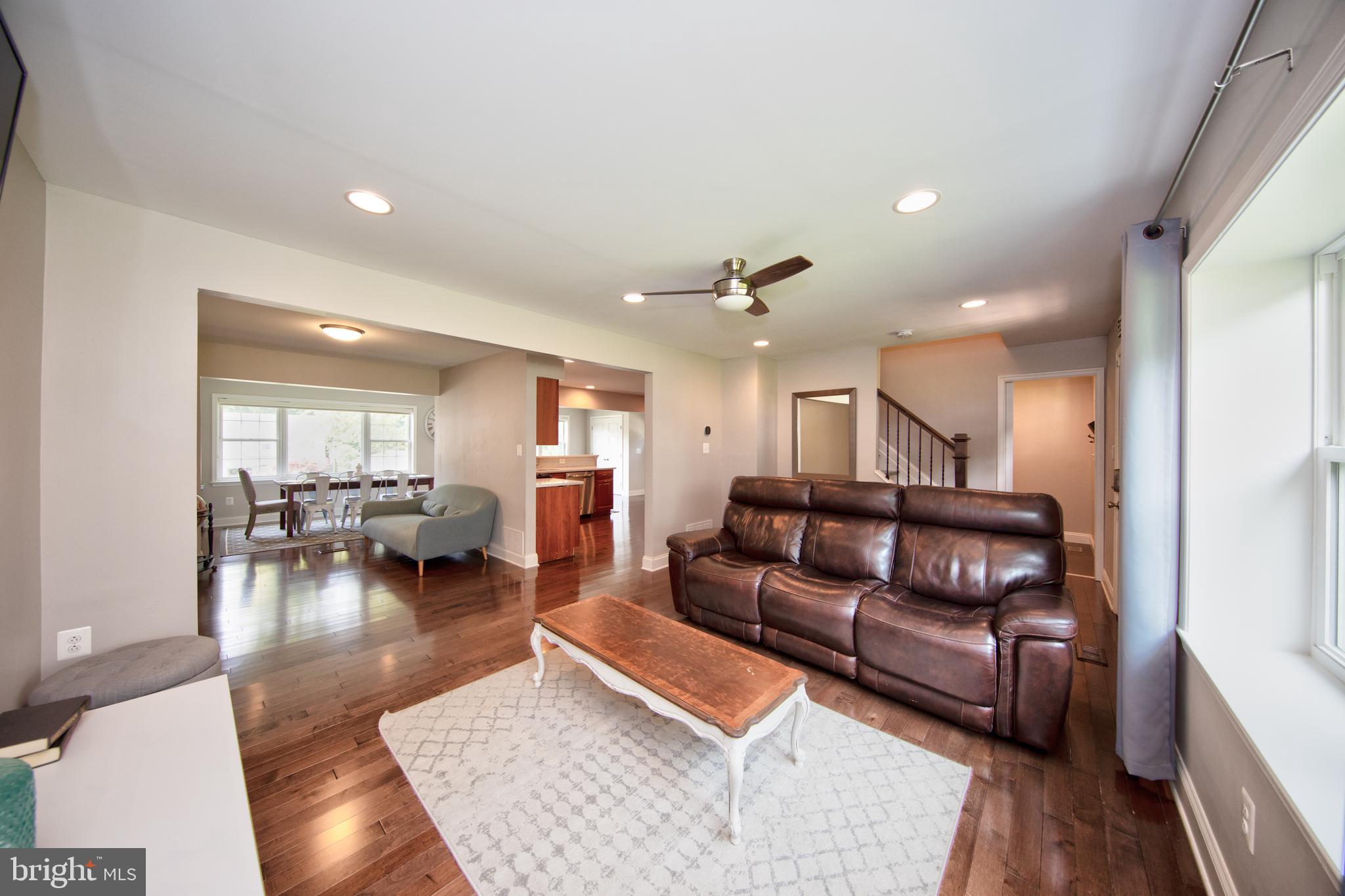 9315 Perglen Road Baltimore, MD 21236 - Photo 32 of 32 a living room with furniture and a wooden floor