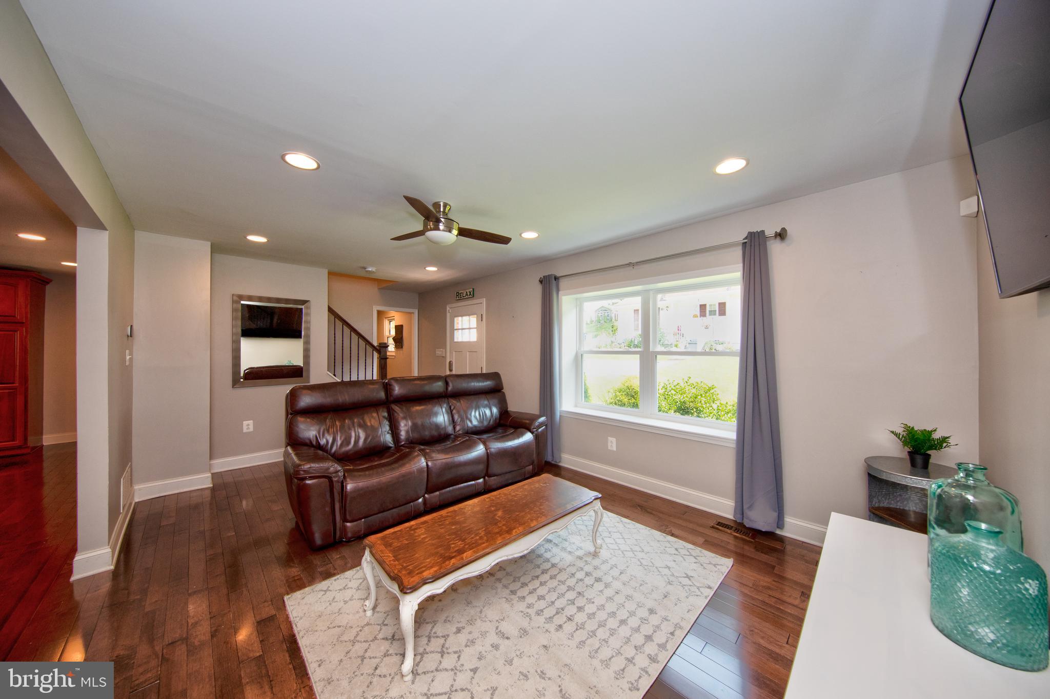 9315 Perglen Road Baltimore, MD 21236 - Photo 2 of 32 a living room with furniture and a window