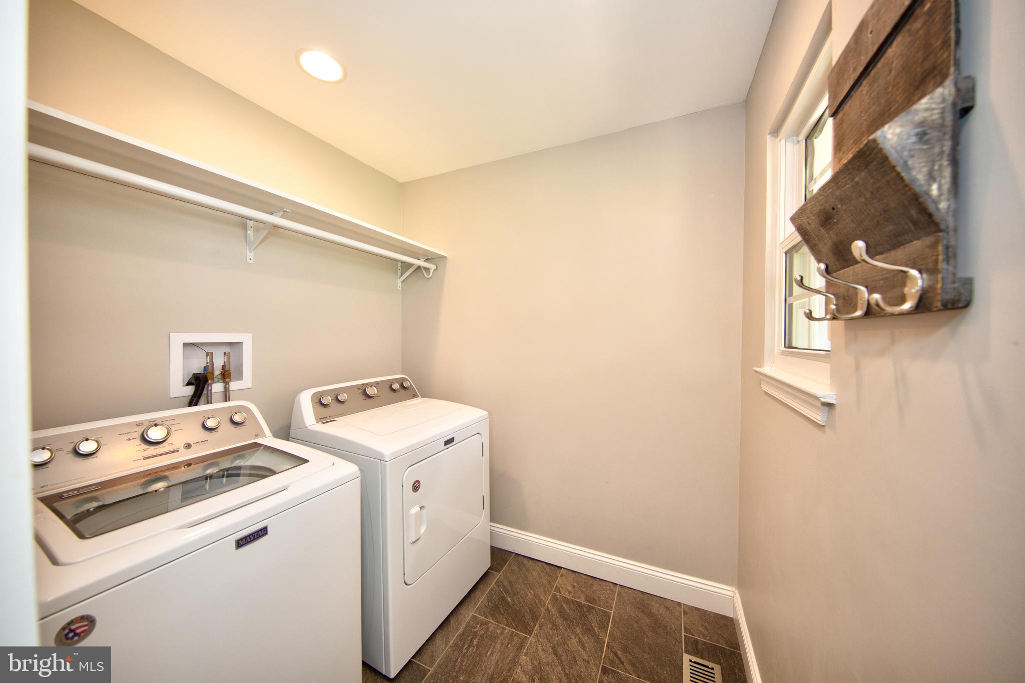 9315 Perglen Road Baltimore, MD 21236 - Photo 21 of 32 a utility room with dryer and washer