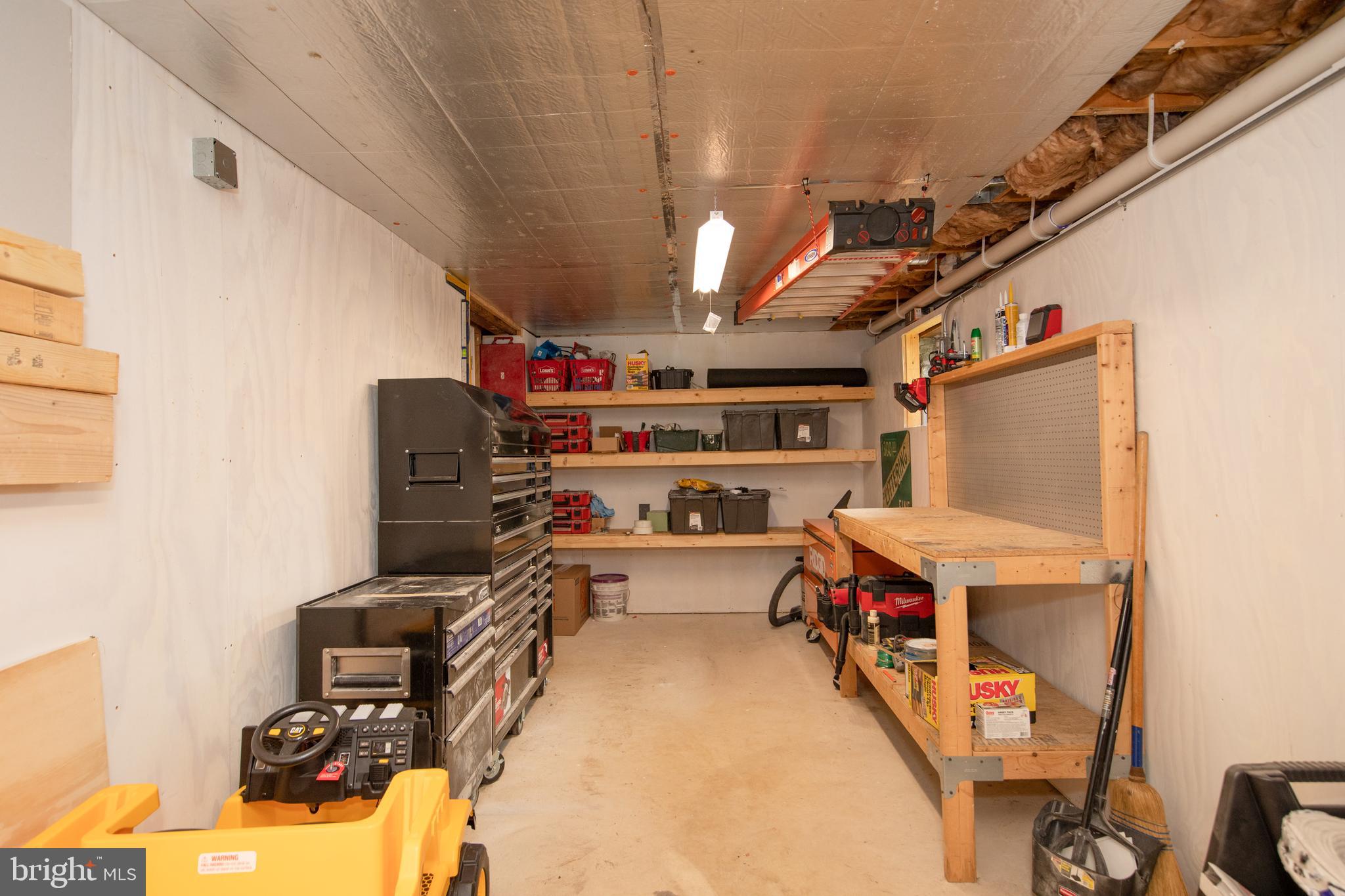 9315 Perglen Road Baltimore, MD 21236 - Photo 28 of 32 a storage room with washer and dryer