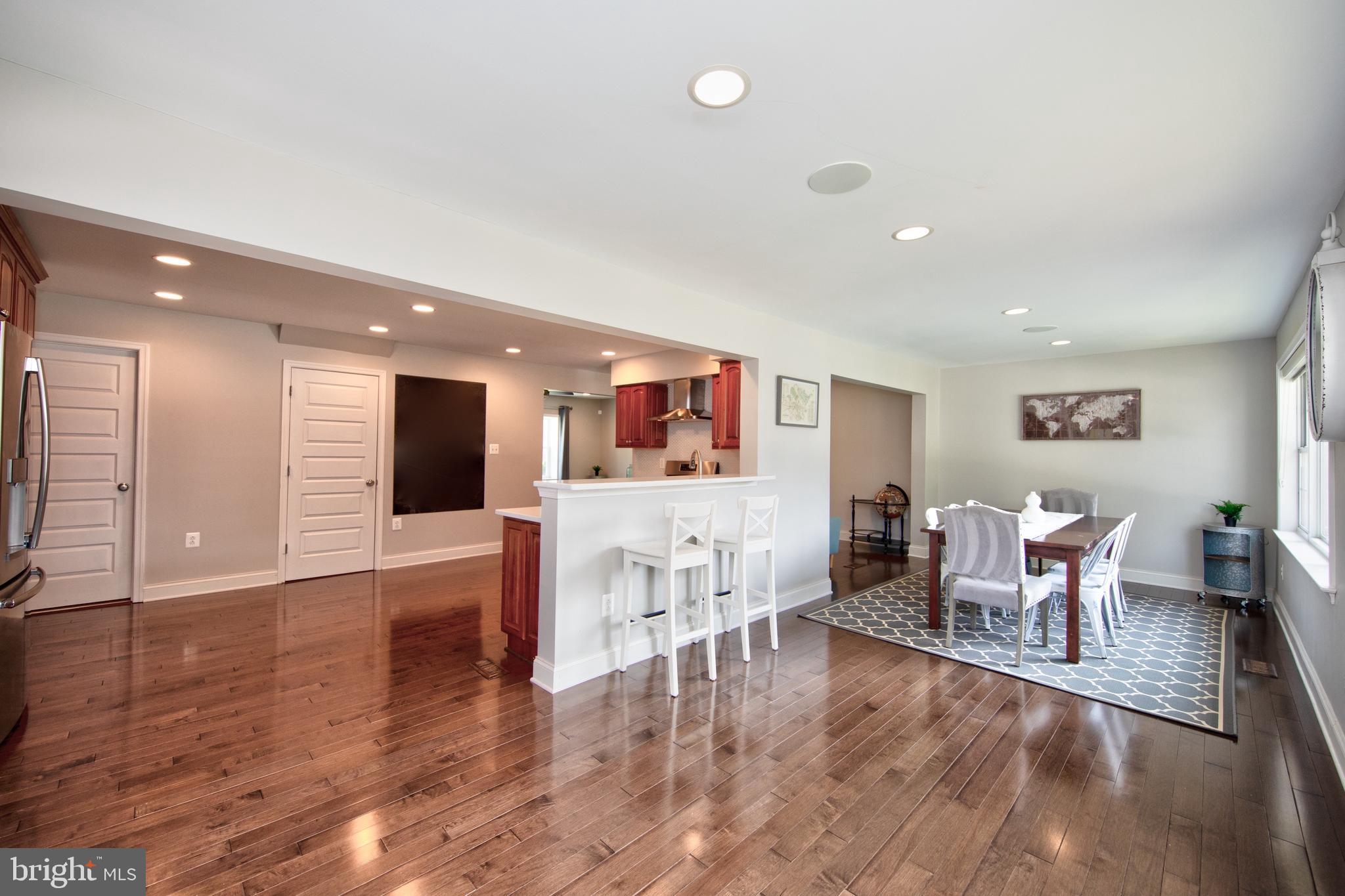 9315 Perglen Road Baltimore, MD 21236 - Photo 6 of 32 a living room with furniture and a wooden floor